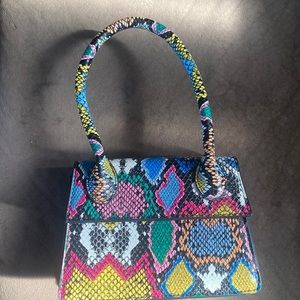 Brand new purse multicolor very fun to wear